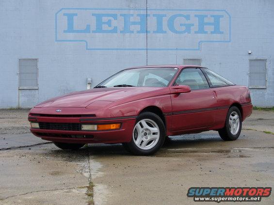 1991 Ford Probe, red, parked outside building with 'LEHIGH' logo