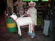 1978 Ford F-250 - A man dressed as a sheep stands with a beer bottle, with other people in the background.