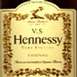 1997 Ford Crown Victoria - A close-up of a Hennessy V.S. Cognac label, ornate gold detailing.