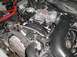 1997 Ford Crown Victoria - The engine bay shows a Ford 4.6L V8 engine, likely from a Panther platform vehicle.
