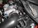 1997 Ford Crown Victoria - Close-up of engine components, focusing on the intake manifold and throttle body assembly.