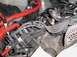 1997 Ford Crown Victoria - This image shows a section of an engine bay with various wires and components, including spark plug wires and red tubing.