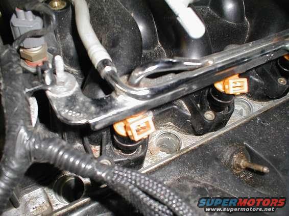 Engine intake manifold with fuel injectors and wiring harness