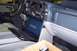 2002 Chevrolet Suburban - A laptop is connected to the dashboard of a 2002 Chevrolet Suburban for diagnostics.