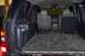 2002 Chevrolet Suburban - Interior view of a 2002 Chevrolet Suburban, showing the cargo area and second-row seating.
