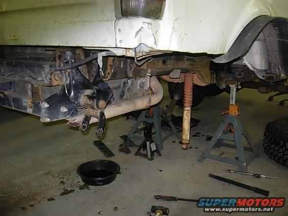 spring hangers hung.  my bumper mounts inside of the frame rails (thank you Rob Elis) so my rear hanger could go way back.the bolt through the hanger is factory center bolt for my bumper.