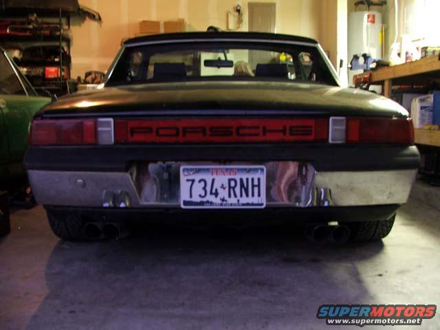Black 1974 Porsche 914 rear view with PORSCHE lettering and Texas license plate