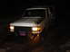 1989 Ford Bronco - This 1987 Ford Bronco is stuck in the mud at night, with a rebel flag attached to the front grille.