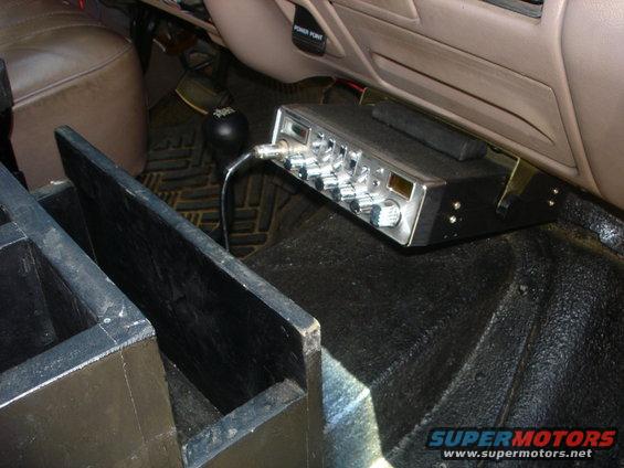 dsc09324.jpg The CB is mounted under the dash.  The block is wedged in on top to keep it at that angle so it doesnt interfere when you open the ash tray.