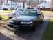 2003 Ford Crown Victoria - Black 2003 Ford Crown Victoria parked in a suburban driveway with another car behind it.