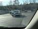2003 Ford Crown Victoria - A silver 2003 Ford Crown Victoria is seen driving on a road with other vehicles.