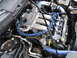1997 Ford Probe - Close-up view of a car's engine compartment, showing various components and wiring harnesses.