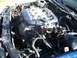1992 Ford Taurus - Engine bay with V6 24-valve DOHC engine, intake manifold, and throttle body visible.