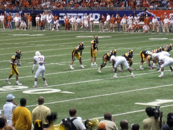 football players lined up on field