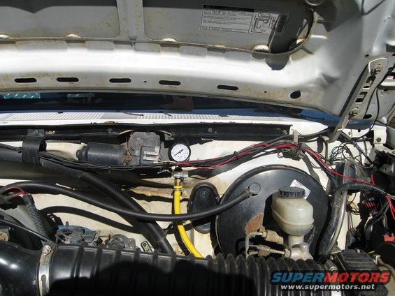 Here is where the gauge is mounted.  Pic taken from a distance to show where it is mounted in relation to the rest of the engine compartment.