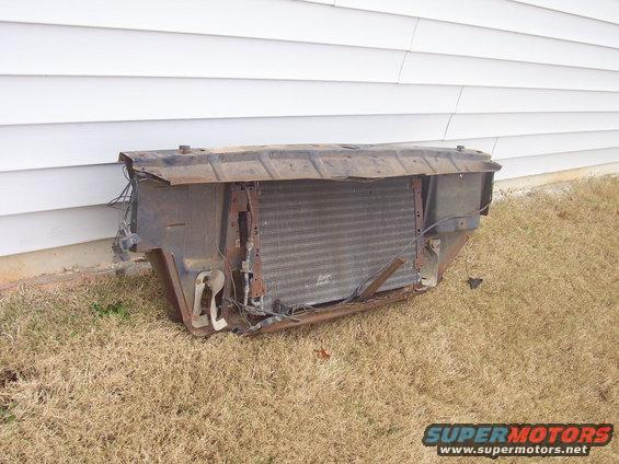 Radiator and grille assembly removed from a vehicle