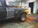 1990 Ford F-350 - This 1990 Ford F-350 pickup truck is seen from the side, equipped with a toolbox in the bed.