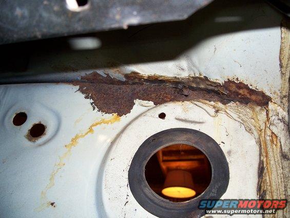 Looky what I found hiding beneath the dash! Damn  . . . . more rust to fix!