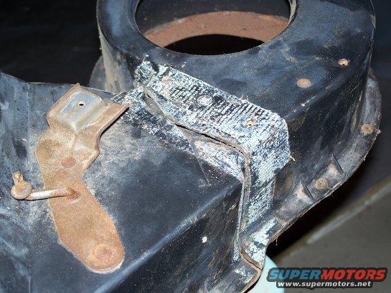 broken plastic . . . cure is duct tape by previous owner. Hmmmm?