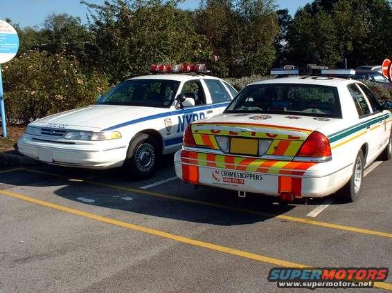 dscf0002.jpg Here are the same 2 vehicles again. In order to drive these vehicles in the UK, you need to make certain adjustments. Notice the blinker on the bottom right hand corner of the 2000 Crown Vic's bumper, for instance. 