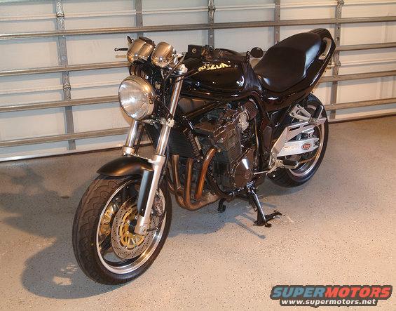Lots of aviation paint striper and steel wool made the polished wheels possible, a donor Buell headlight, bored out exhaust, shaved down seat, K&N, re-jetted mikuni carbs, new tires, homemade tail turn signal and plate kit, lower holeshot handlebars, one of the fastest bikes I've ever owned or ridden!!