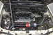 1990 Ford Taurus - Close-up of a modified engine bay, a prominent SHO 24 VALVE DOHC intake manifold and turbo components.