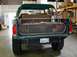 1989 Ford Bronco - Rear view of a 1989 Ford Bronco, modified with a cargo rack and aftermarket bumper.