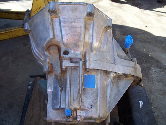 Aluminum transmission housing with blue tape on fittings