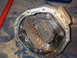 1989 Ford Bronco - This image shows a close-up of a differential housing, revealing its internal gears and a significant amount of old grease.