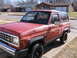1984 Ford Bronco II - This 1984 Ford Bronco II features a V6 engine and distinctive side trim.