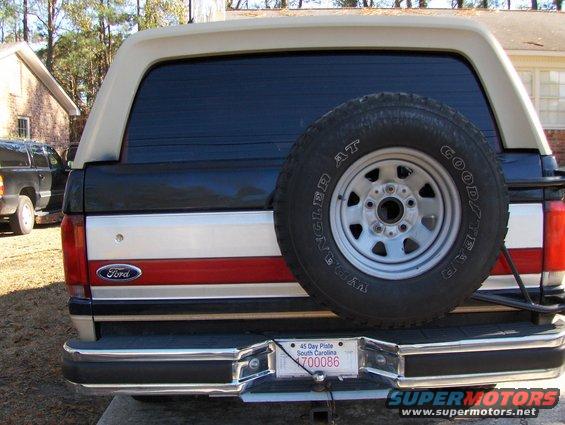 Rear view of a 1991 Ford Bronco with a spare tire mounted on the back and a South Carolina license plate