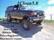 1991 Ford Bronco - This modified 1991 Ford Bronco is shown off-road with custom suspension and drivetrain upgrades.