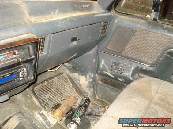 Interior view of a 1989 Ford F-250 showing dashboard, radio, and seats