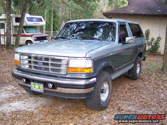 Silver and dark gray 1996 Ford Bronco 3/4 front view