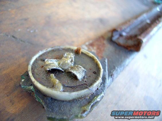 And the other side of the rivet, the part splayed at the factory.