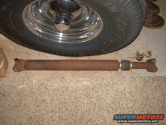 Pulled the front shaft on the '88 bronco.  Hindered by lots of rust and took a lot of lube to bust the half inch nuts loose.  Also the caps were frozen to the yoke on the transfer case end.