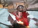 1978 Ford Bronco - A transmission part is removed, with red fluid spilled on shop towels and a socket wrench.