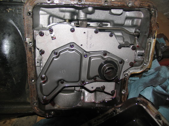 transmission pan removed showing filter and valve body