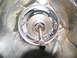 1978 Ford Bronco - Close-up view of the internal components of an automatic transmission, showing the torque converter housing and input shaft.