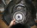 1978 Ford Bronco - Close-up view of a disassembled automatic transmission, focusing on the torque converter and its housing.