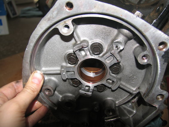 Close-up of transmission part with bearing and bolts