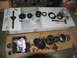 1978 Ford Bronco - Various components of a disassembled automatic transmission are spread out, ready for inspection or repair.