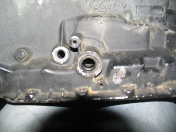 Close-up of Ford transmission casing with visible ports