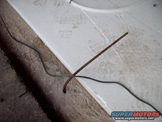 img_0002.jpg Drill into the existing footing and install 90 degree bent re-bar and you're good to go.