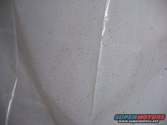 100_0292.jpg over spray on the walls. If ya dont want bedliner on it, cover it!