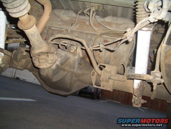 Undercarriage view of rear axle and fuel tank