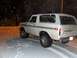 1979 Ford Bronco - 1979 Ford Bronco in the snow. The tailgate displays the website FULLSIZEBRONCO.COM and the Ford logo.
