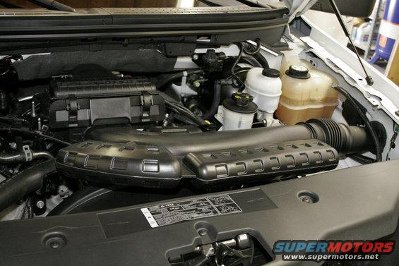 mac09.jpg Now that the programmer is done we can move on to the engine bay. The stock intake is large, ugly, and a little intimidating in its complexity, don't worry though, removal is much simpler then it looks.