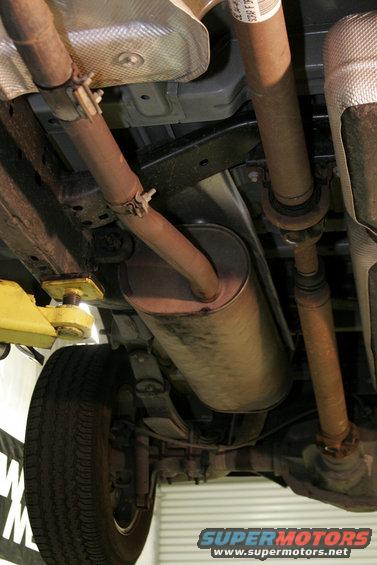 mac27.jpg Of course this job is easier with the truck on the lift but this is something you could do simply in your driveway. Begin by loosening the double bolt clamp in front of the muffler.