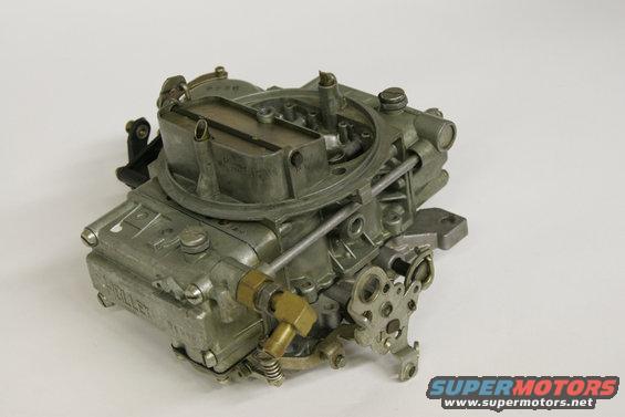 qft03.jpg With the exterior and individual bores of the carb clean we are ready to start removing the old parts.
